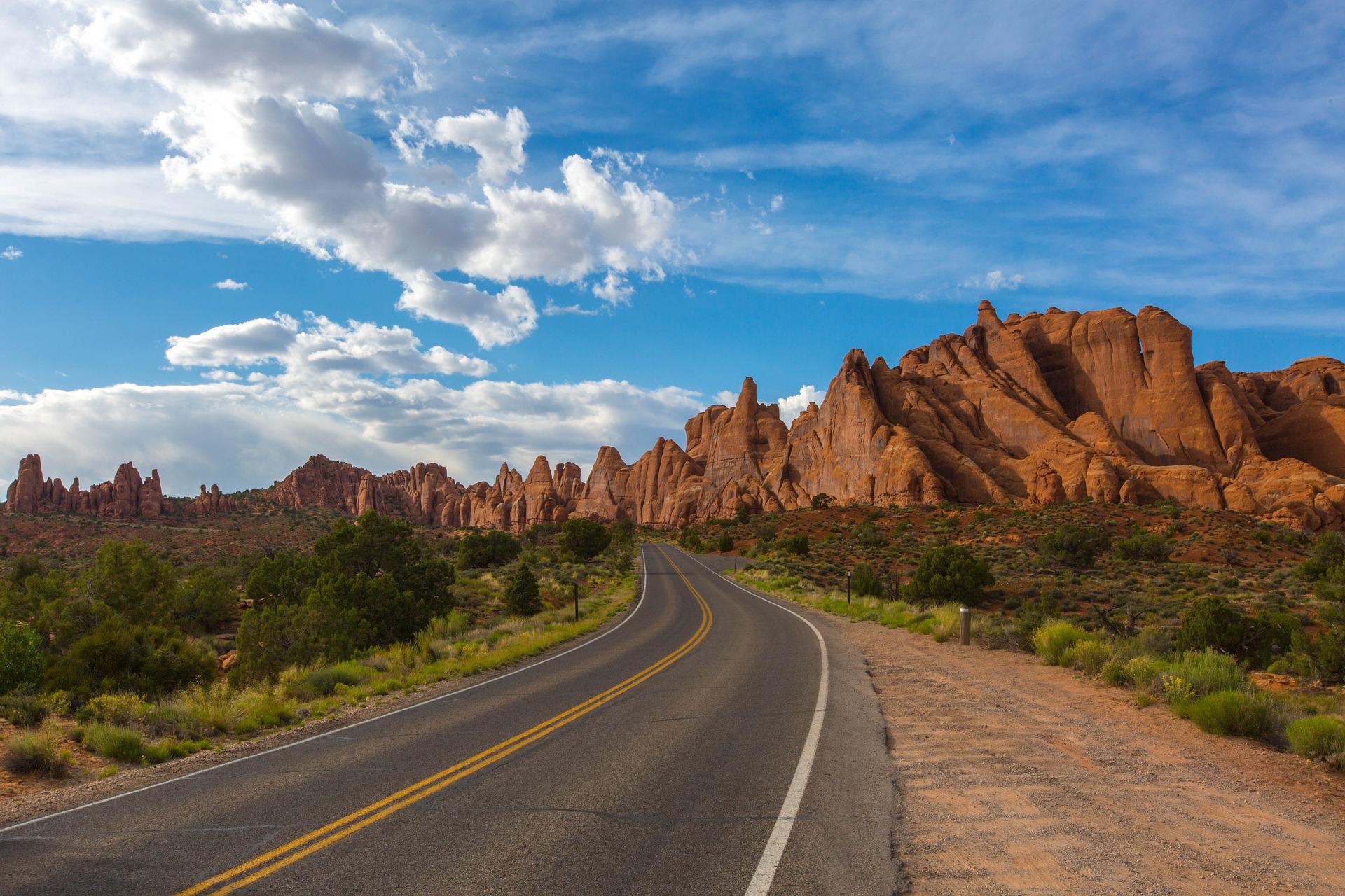 A road going through a canyon in Utah